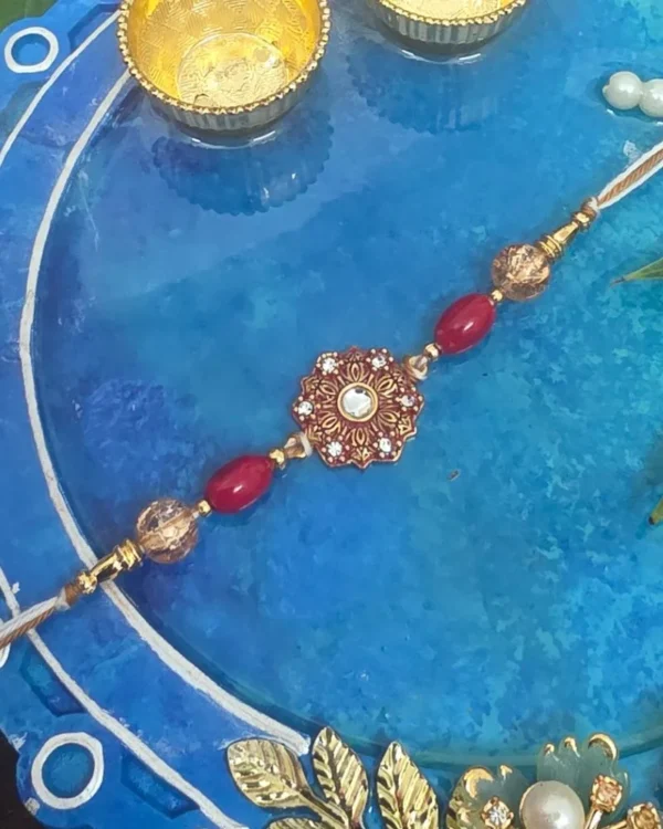 लाल-सुनहरी सिंगल राखी